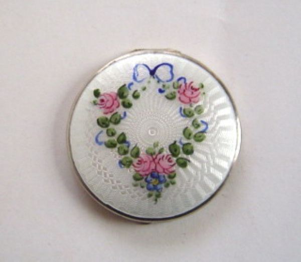 Tiny silver and enamel powder compact