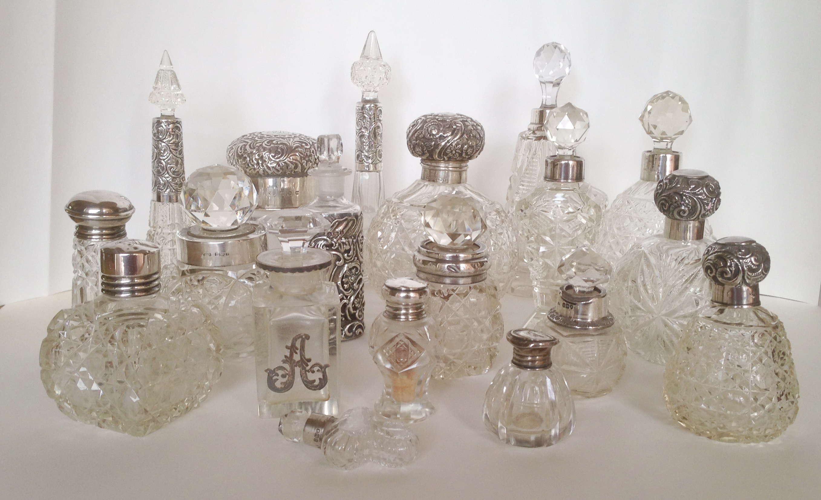 Clear bottles with silver mounts