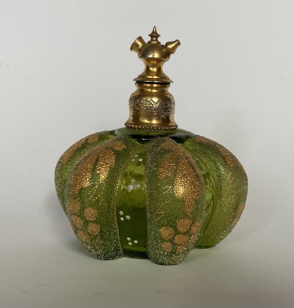 Green atomiser with gilding